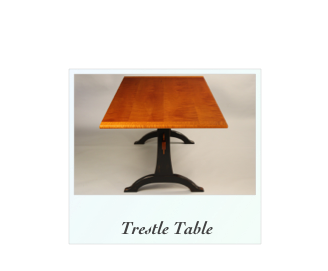 ￼ 
 Trestle Table